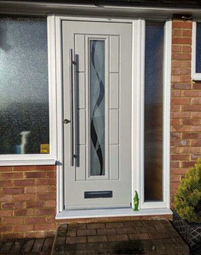 A lovely Agete Grey Vermont Rockdoor with Haze glass design and a stainless steel bar handle, fitted in Dunstable
