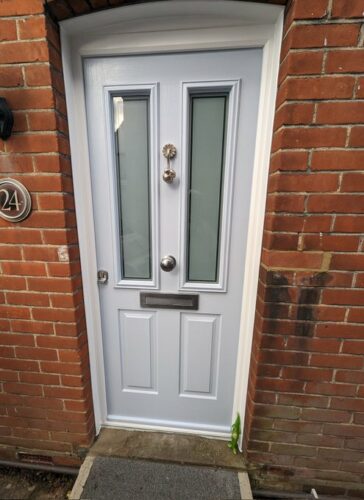 A stylish Duck Egg Blue Ludlow 2 Solidor with Victorian glass design alongside the super secure Ultion Cylinder fitted in Harpenden