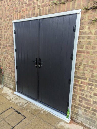 A beautiful Black Carburton French Door from Solid Core Doors with the super secure Ultion Cylinder fitted in St Albans