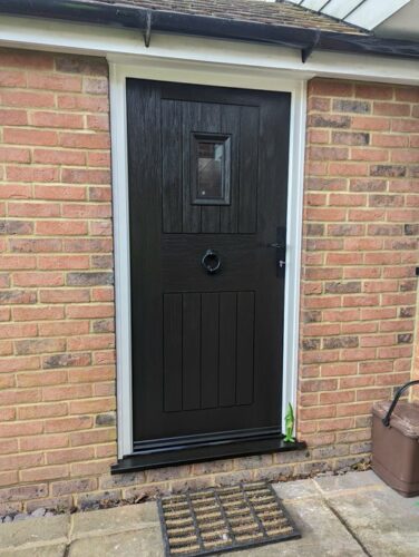 A beautiful Black Cottage Spy View from Rockdoor with Twist Black Antique door handles and a Black Antique Ring Door Knocker from Costal fitted in Hitchin