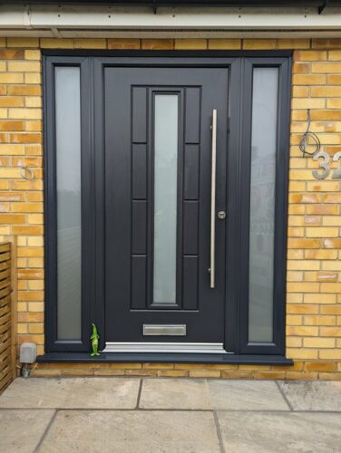 A striking Anthracite Grey Vermont Rockdoor with Stainless steel bar handles fitted in Hatfield