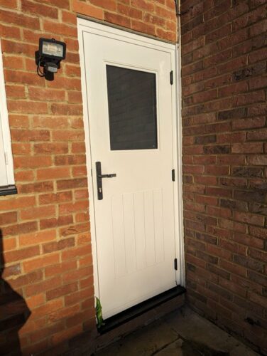 A wicked White Cottage View Light from Rockdoor with Twist Black Antique door handles from Costal fitted in Hitchin