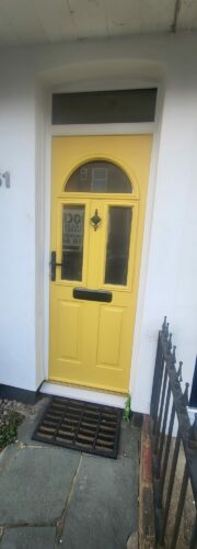 An eyecatching Buttercup Yellow Conway 3 Solidor, with lovey Antique Black furniture alongside the super secure Ultion fitted in St Albans